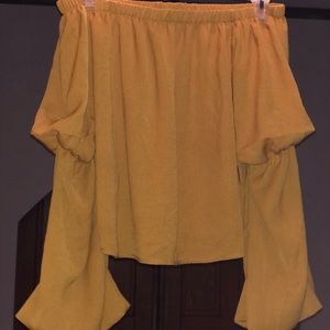mustard yellow off the shoulder flared blouse